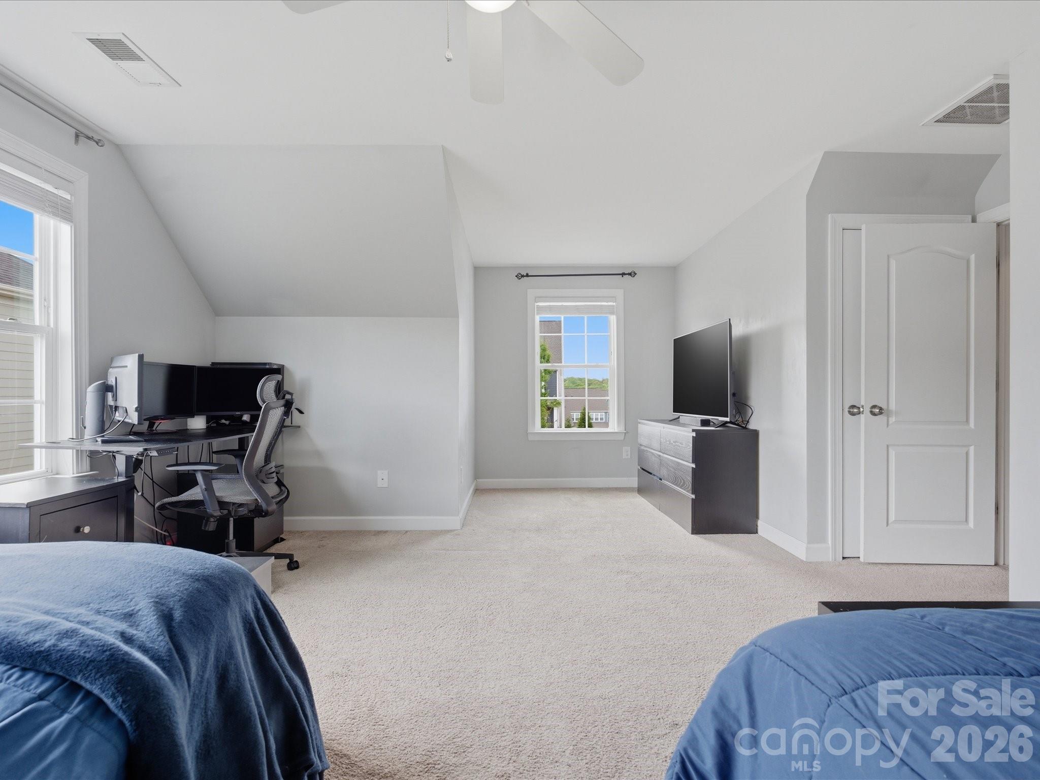 932 Twin Valley Way Fort Mill, SC 29715 - Photo 26 of 48 a bedroom with a bed and a television
