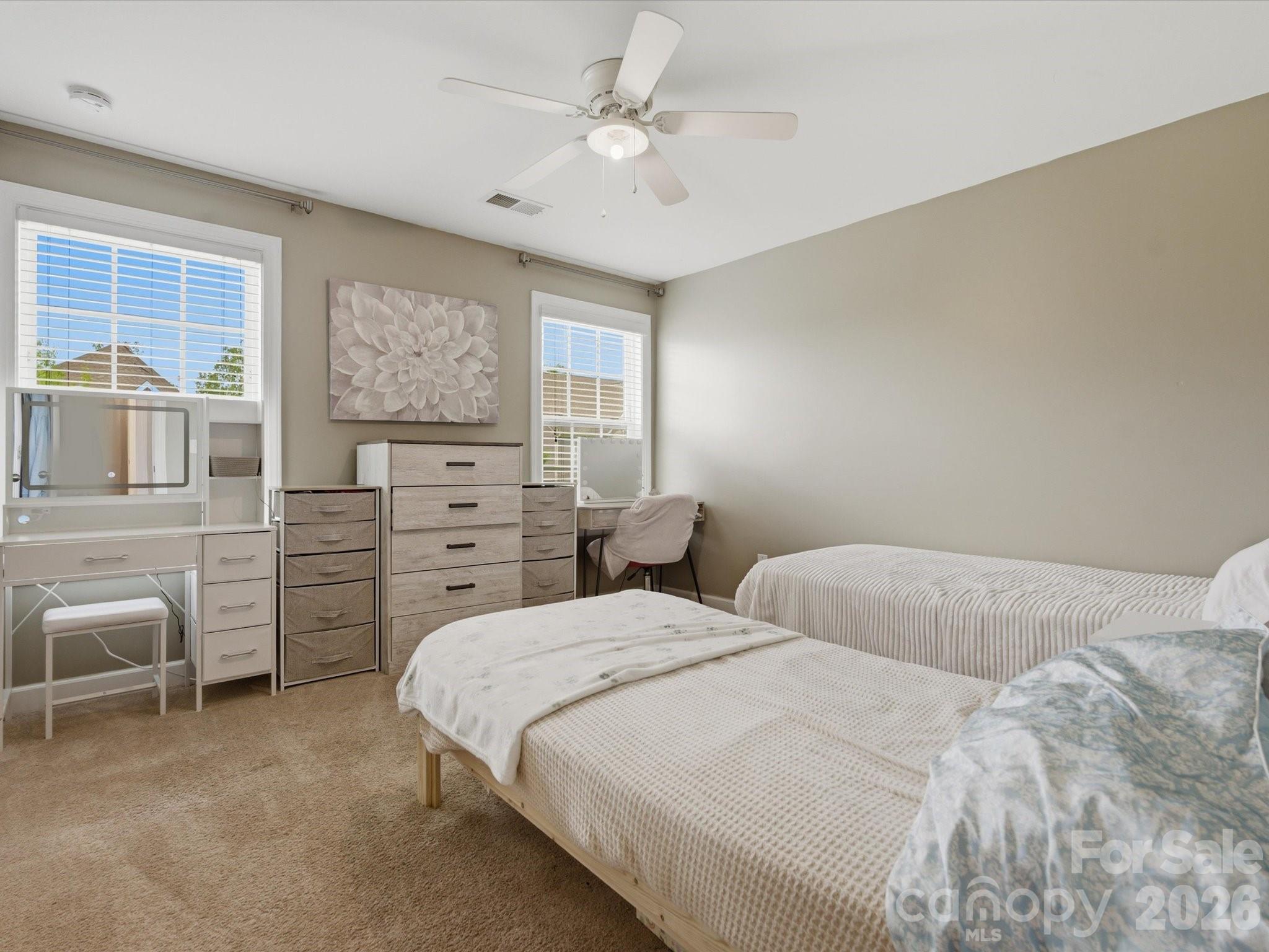 932 Twin Valley Way Fort Mill, SC 29715 - Photo 29 of 48 a bedroom with a bed and a window