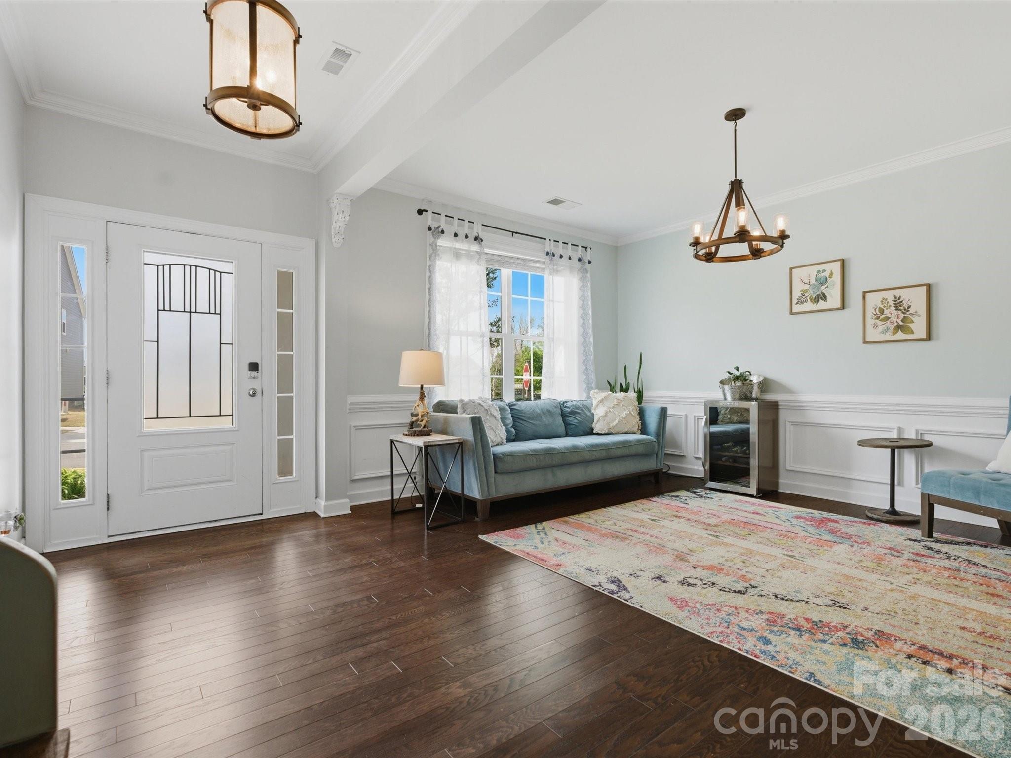 932 Twin Valley Way Fort Mill, SC 29715 - Photo 3 of 48 a living room with furniture and wooden floor