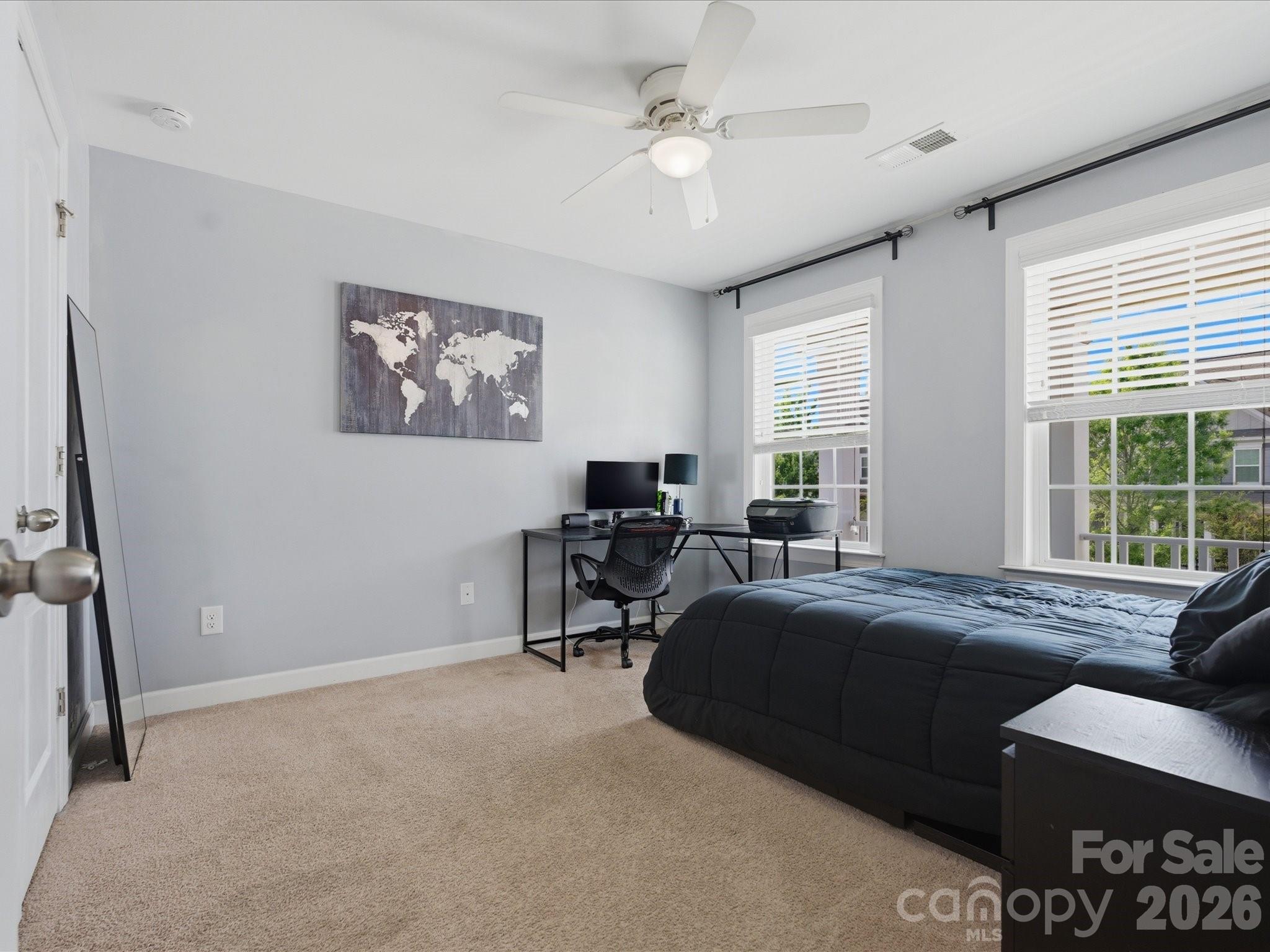 932 Twin Valley Way Fort Mill, SC 29715 - Photo 31 of 48 a bedroom with furniture and a window