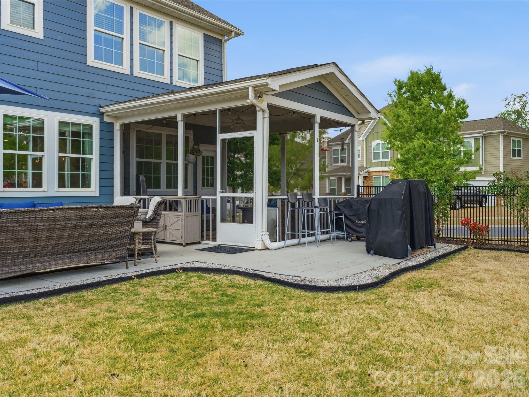932 Twin Valley Way Fort Mill, SC 29715 - Photo 35 of 48 a house view with a seating space and wooden fence