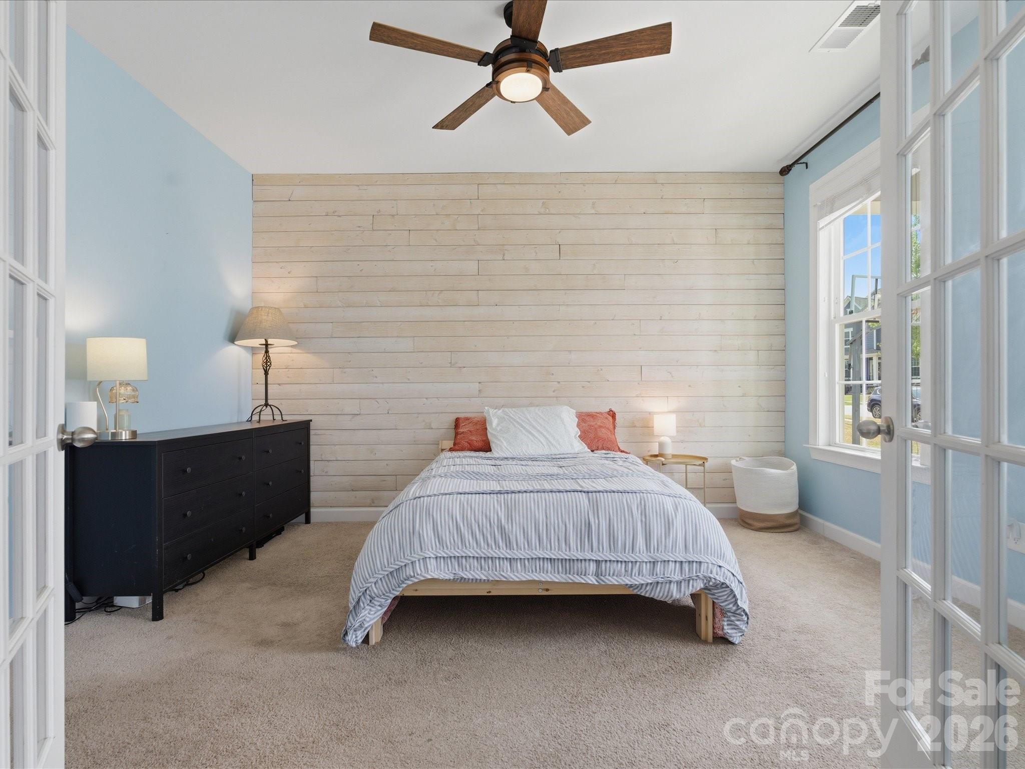 932 Twin Valley Way Fort Mill, SC 29715 - Photo 5 of 48 a bedroom with a bed and a window