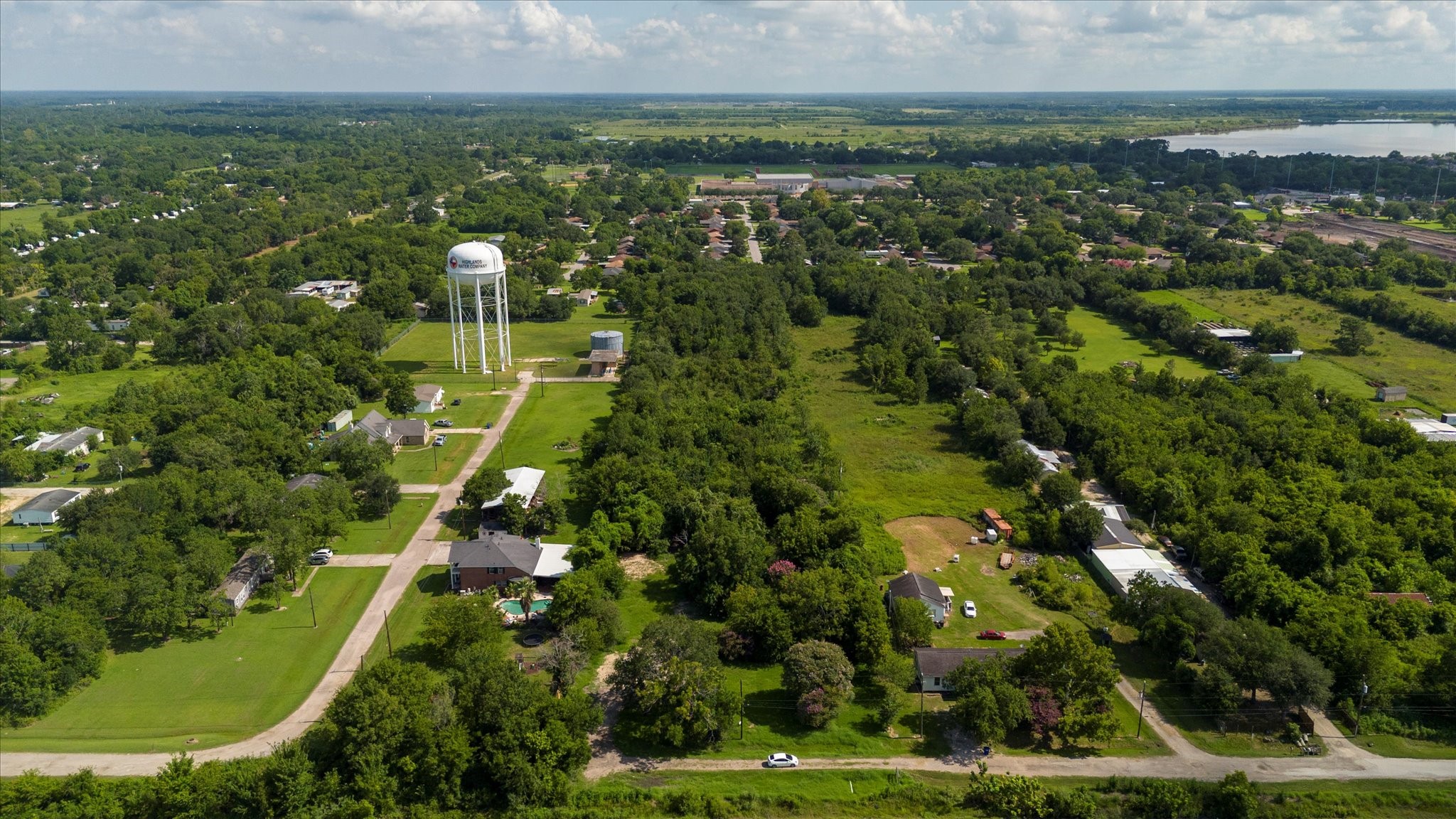 1102 North Battlebell Road Highlands, TX 77562 - Photo 6 of 11 an aerial view of residential houses with outdoor space and trees