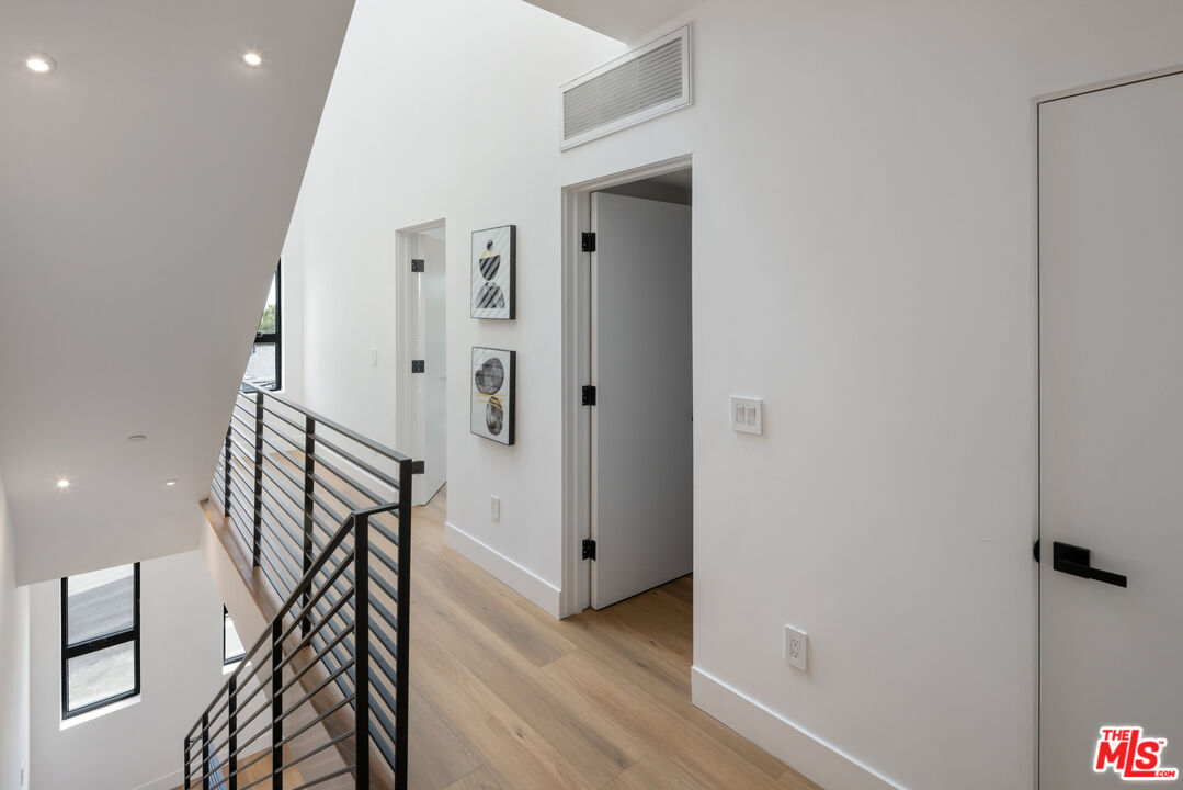 2003 Bellevue Avenue Los Angeles, CA 90026 - Photo 15 of 30 a very nice looking room with wooden floor and stairs