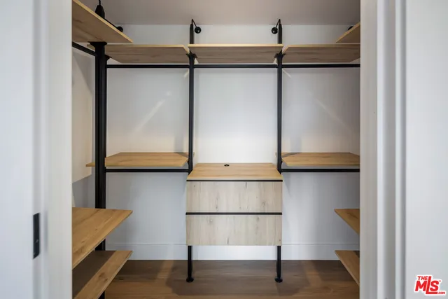 a view of staircase with a rug