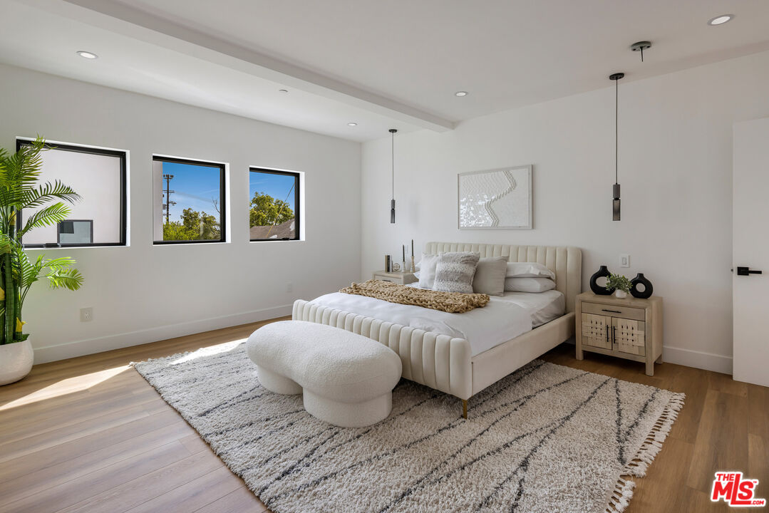 2003 Bellevue Avenue Los Angeles, CA 90026 - Photo 20 of 30 a room with a bed and a couch