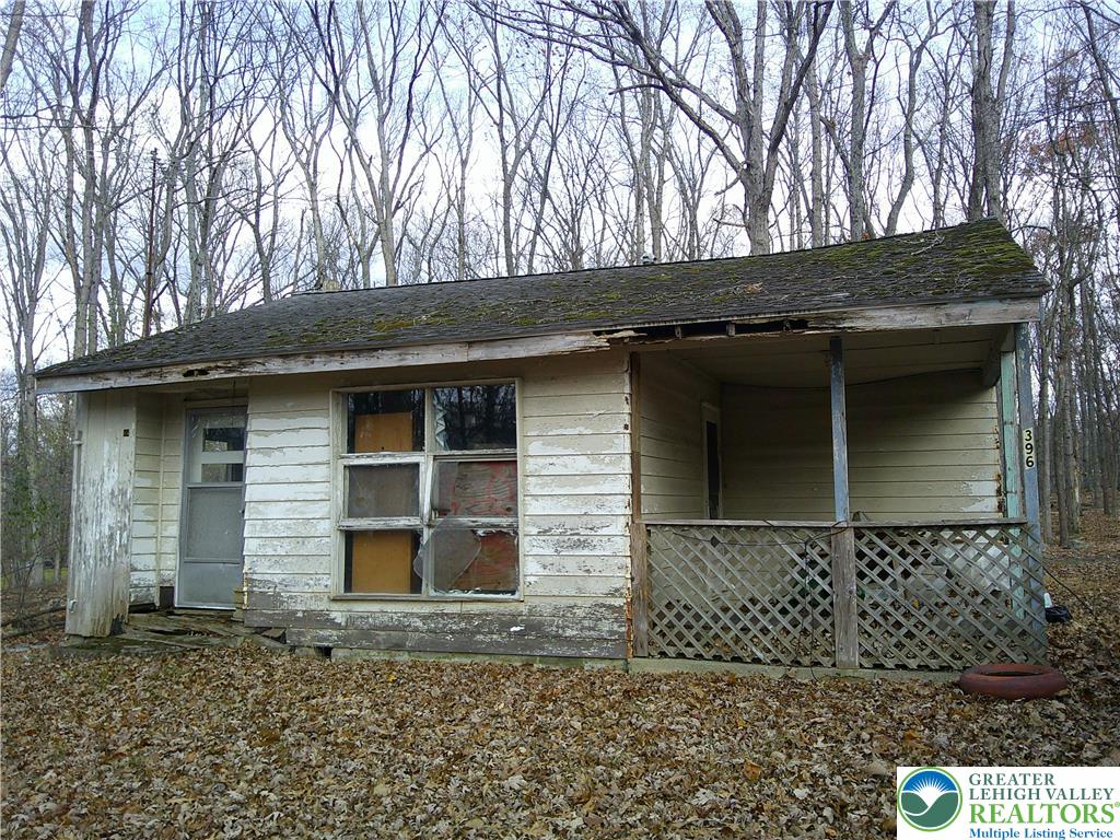 396 Turkey Ridge Road Mount Bethel, PA 18343 - Photo 1 of 9 front view of a stone house