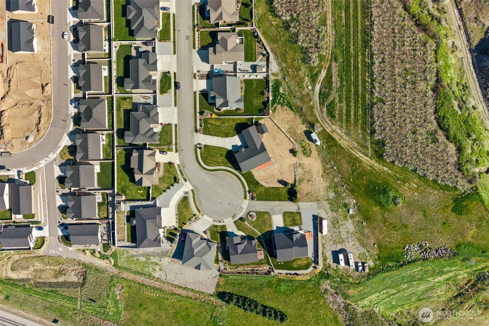 229 Sun Valley Drive Wenatchee, WA 98801 - Photo 39 of 40 an aerial view of residential houses with outdoor space and parking