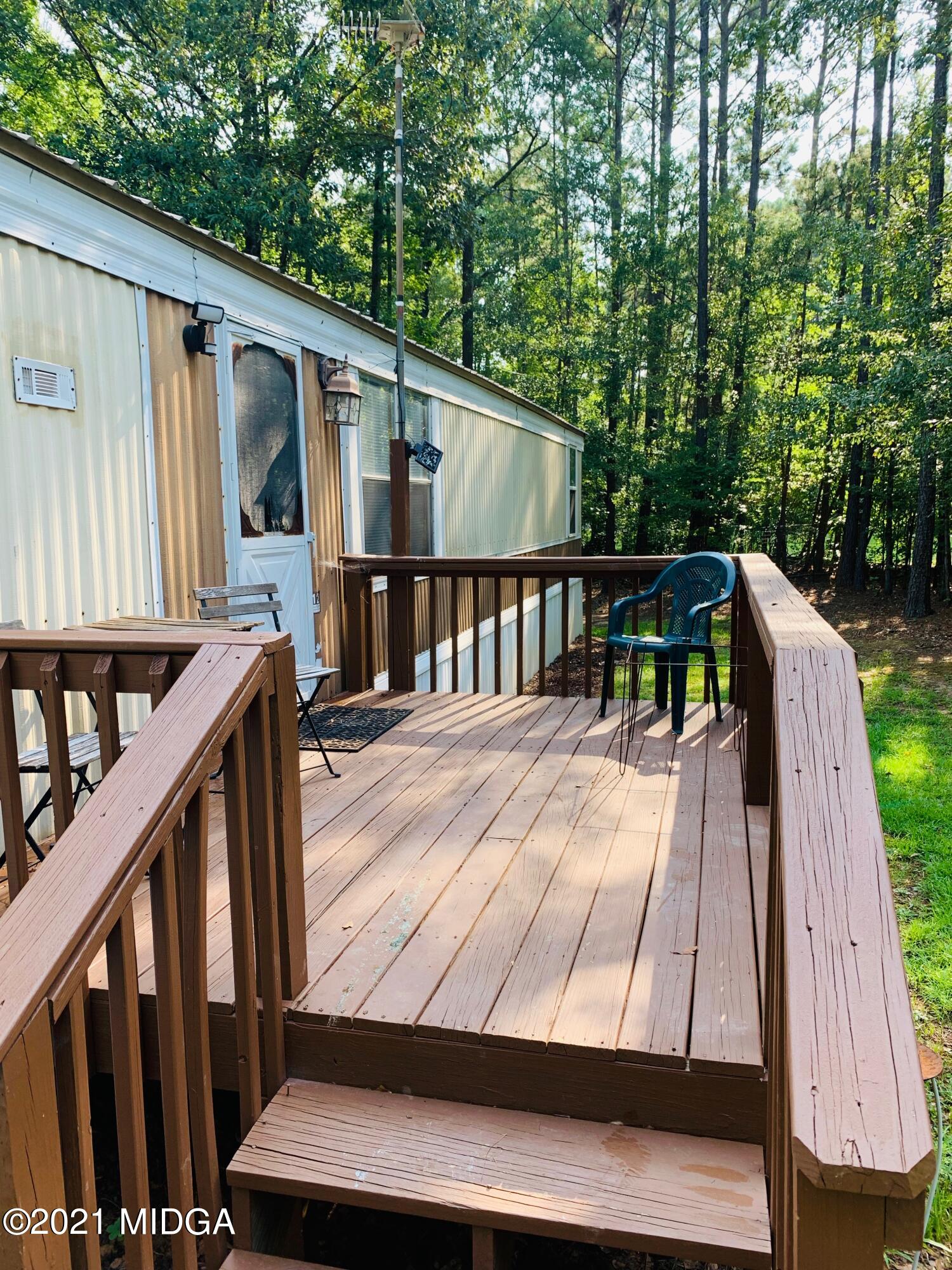 777 Watson Road Forsyth, GA 31029 - Photo 5 of 16 a view of deck with patio