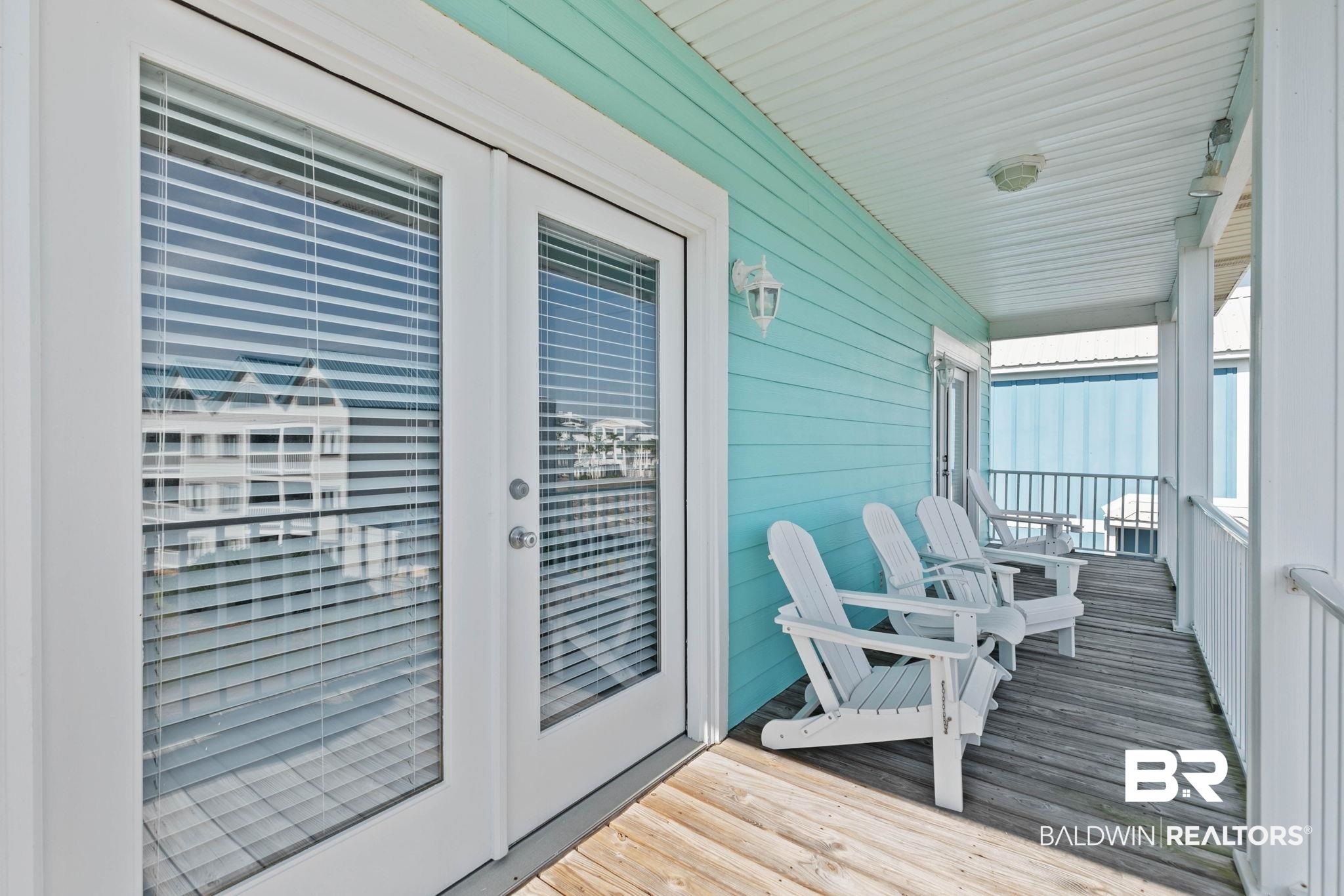 545 Plantation Road, Unit 3 Gulf Shores, AL 36542 - Photo 40 of 54 View of wooden porch