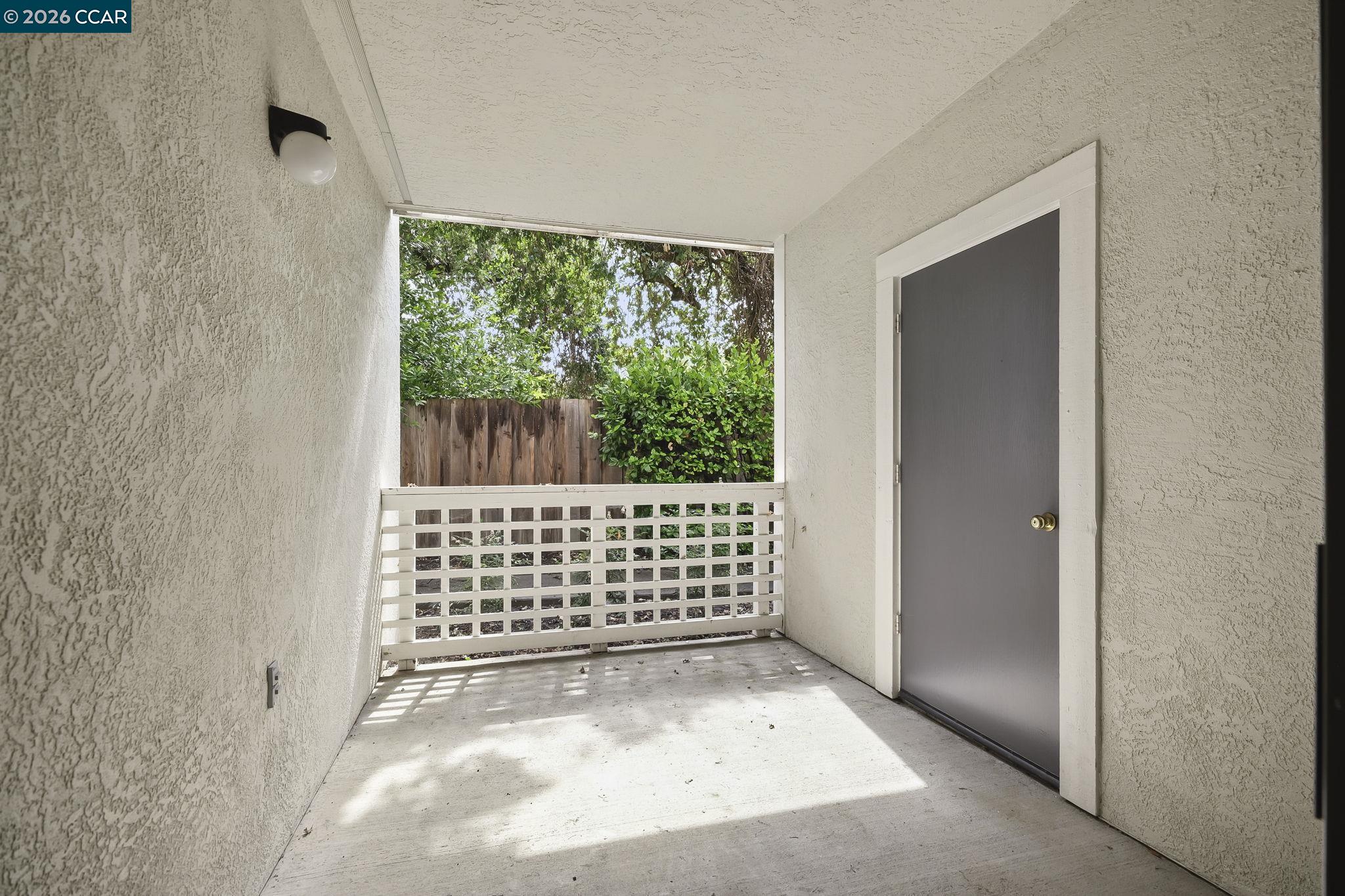 2586 Oak Road, Unit 130 Walnut Creek, CA 94597 - Photo 19 of 31 a view of a porch