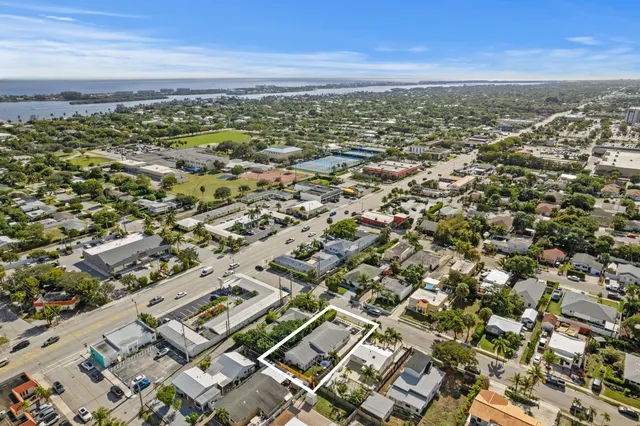 an aerial view of residential building with parking space