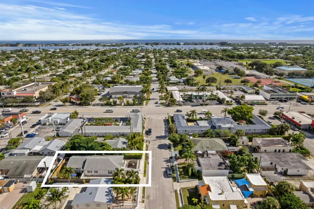 an aerial view of residential building with parking space