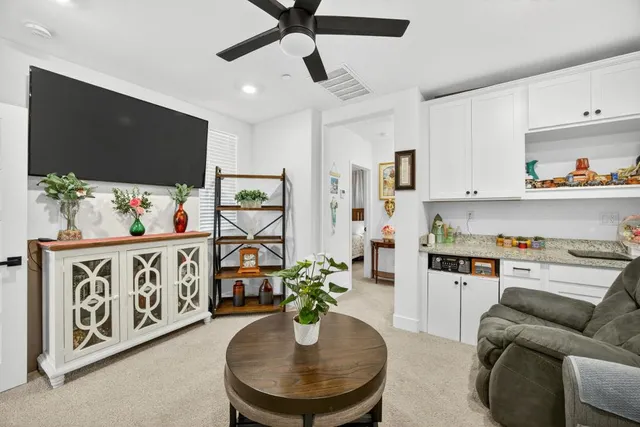 a view of a hallway with white walls