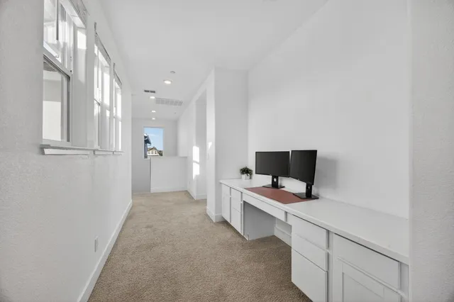 a front view of a house with a yard and porch