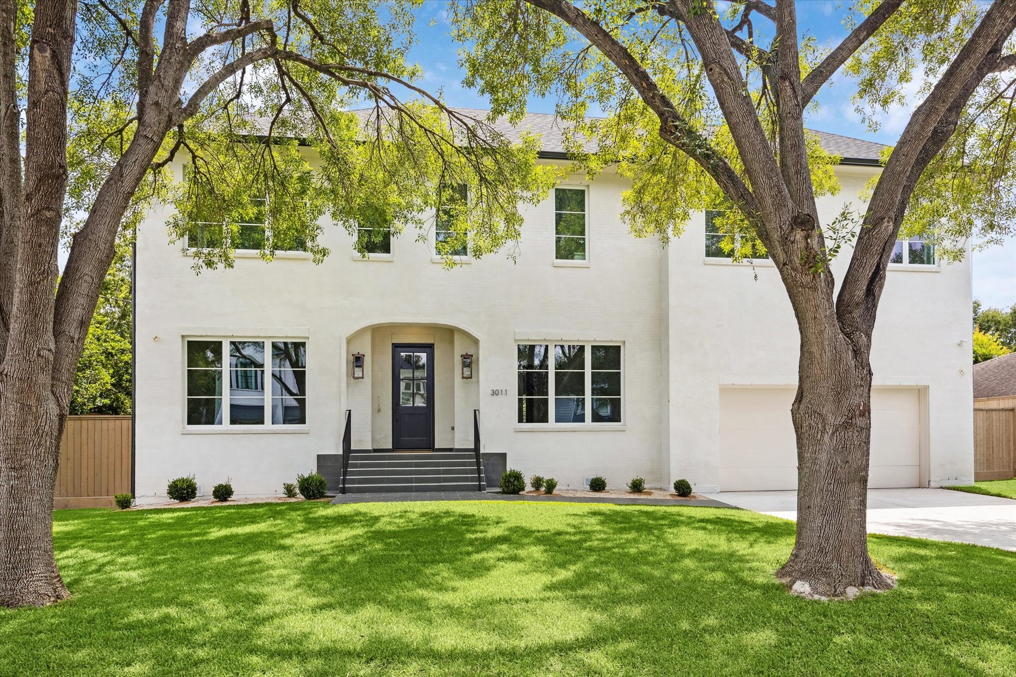 a house view with a garden space