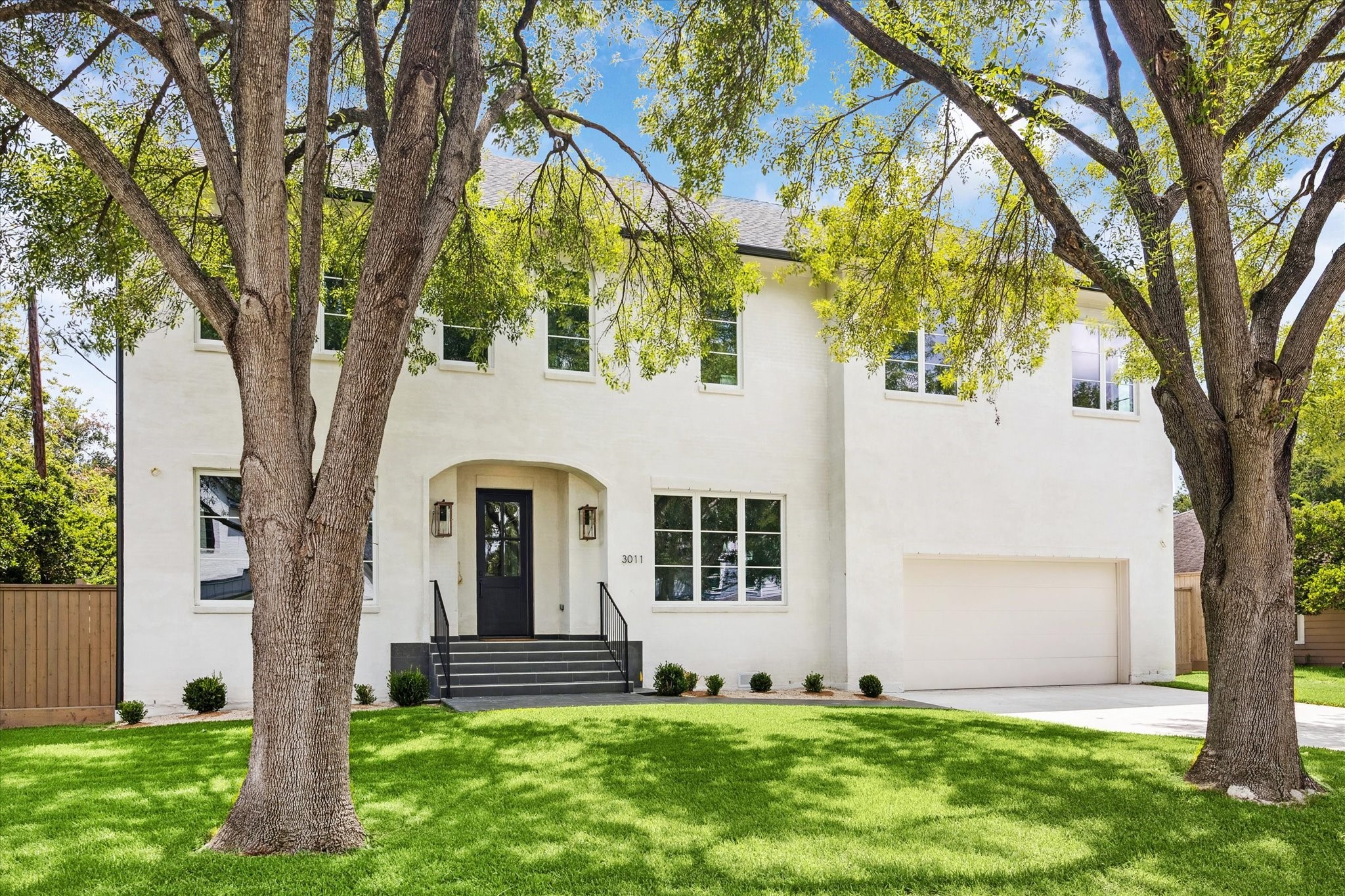 3011 Deal Street Houston, TX 77025 - Photo 2 of 45 a front view of a house with a yard and large tree