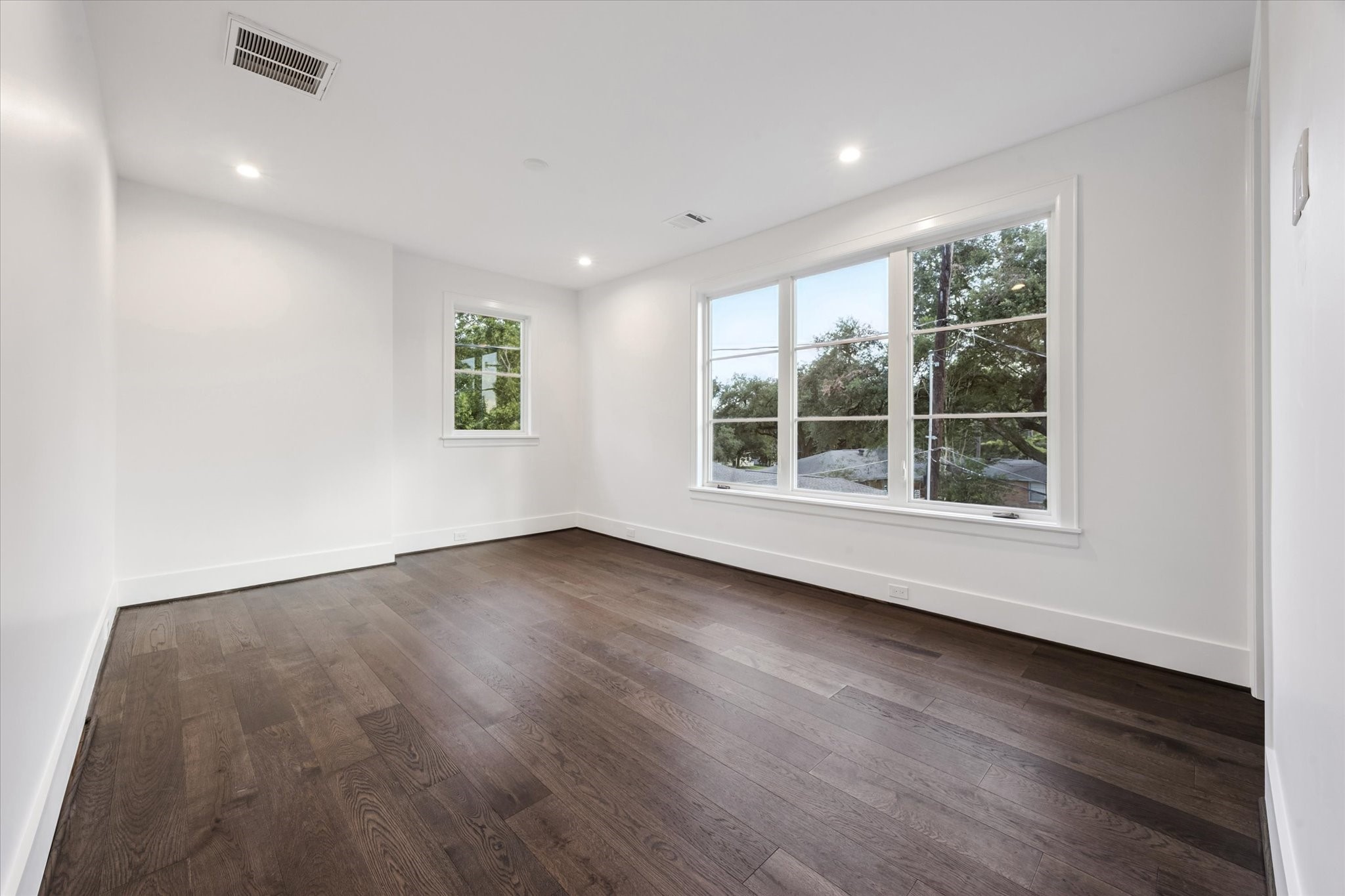 3011 Deal Street Houston, TX 77025 - Photo 29 of 45 an empty room with wooden floor and window