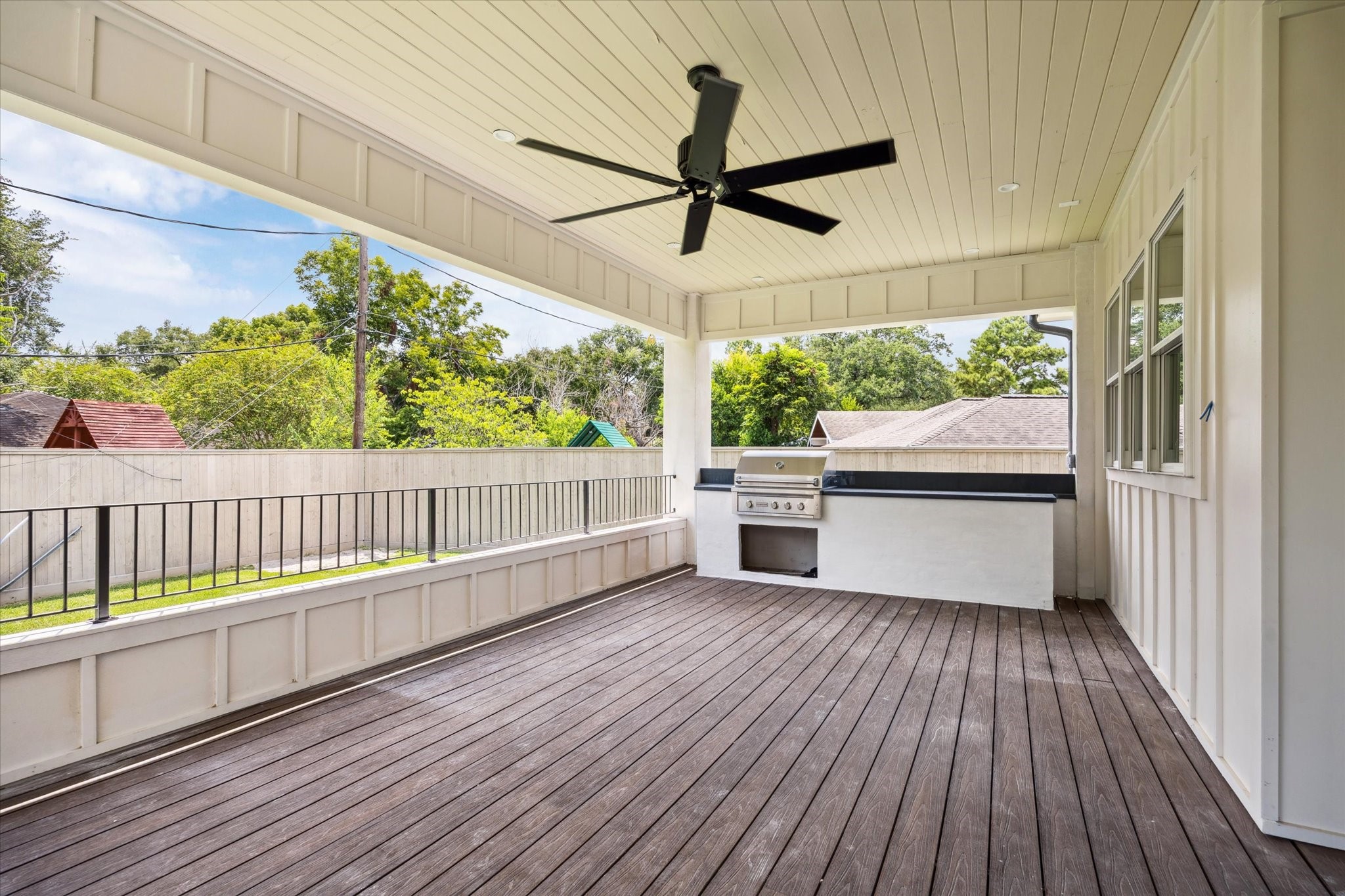 3011 Deal Street Houston, TX 77025 - Photo 5 of 45 a view of a balcony with wooden floor
