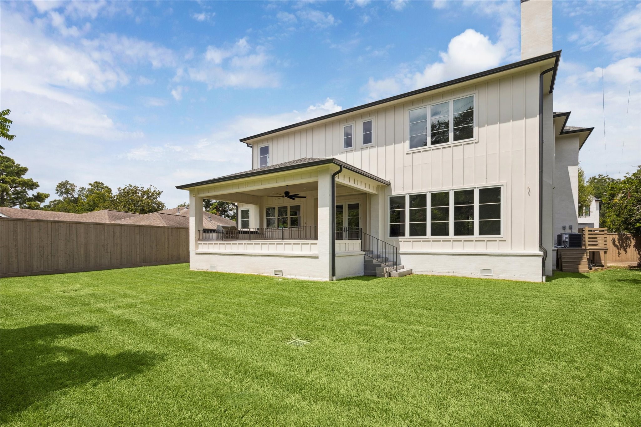 3011 Deal Street Houston, TX 77025 - Photo 6 of 45 a front view of a house with a yard and garage