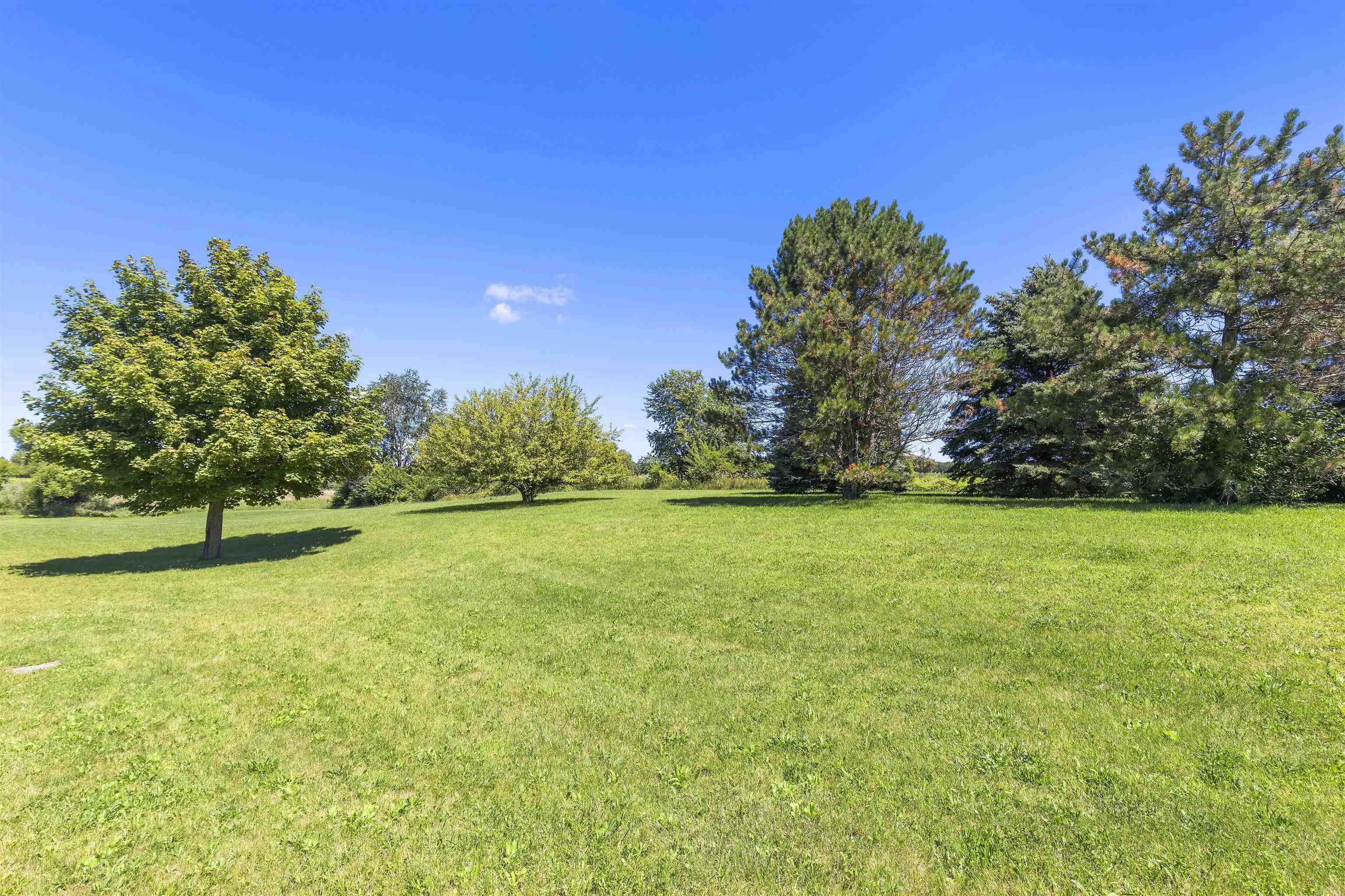 708 Busse Road Marengo, IL 60152 - Photo 45 of 60 a view of a field with trees in the background