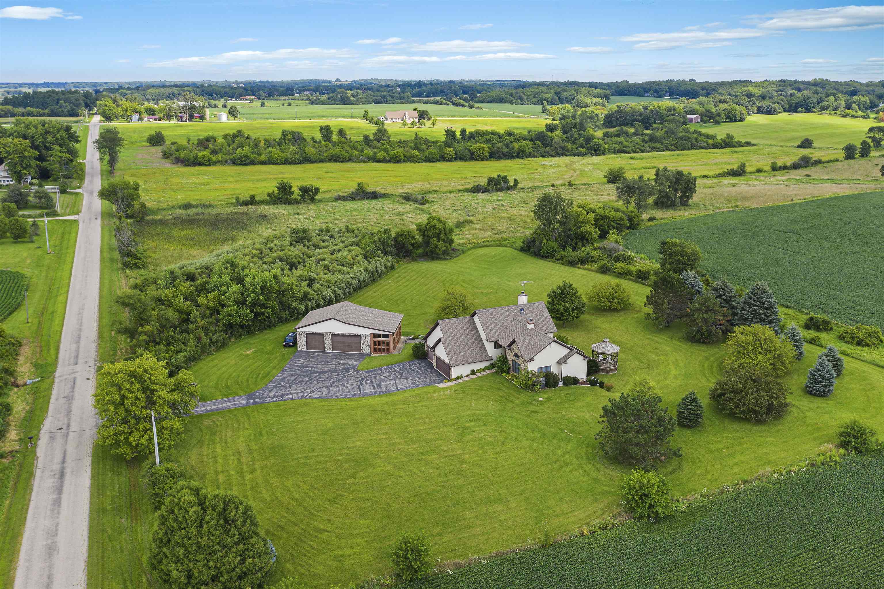 708 Busse Road Marengo, IL 60152 - Photo 54 of 60 a view of a lake with a houses