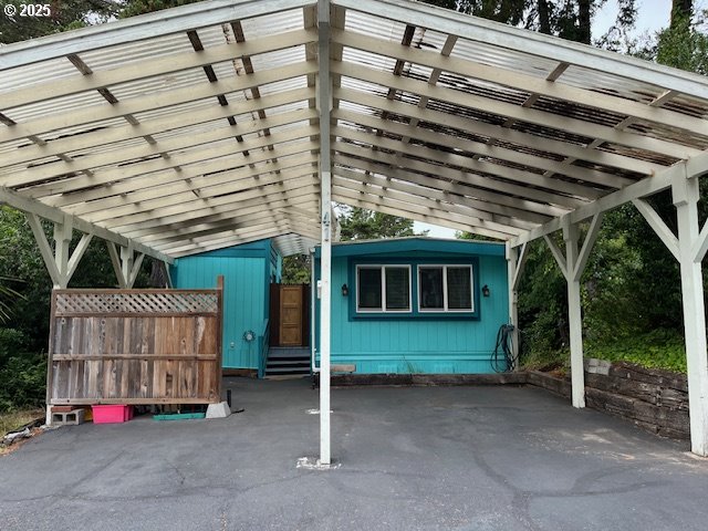 a view of backyard with cabin