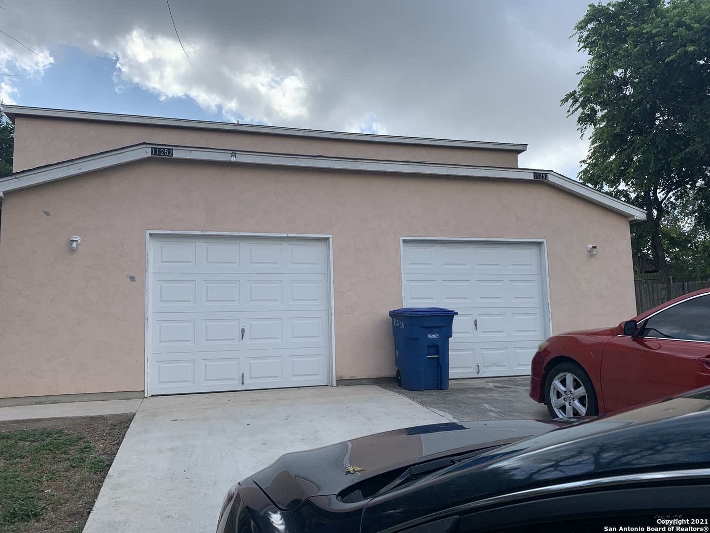 11252 Center Point Road San Antonio, TX 78233 - Photo 2 of 7 a view of a house with a garage