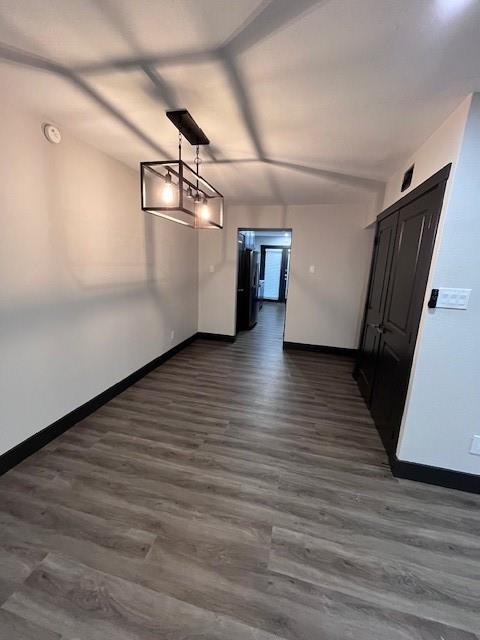 7734 Meadow Road, Unit 117 Dallas, TX 75230 - Photo 6 of 15 a view of a living room with wooden floor and staircase