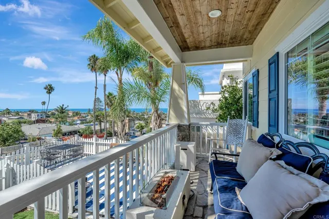 a living room with furniture fireplace and a flat screen tv