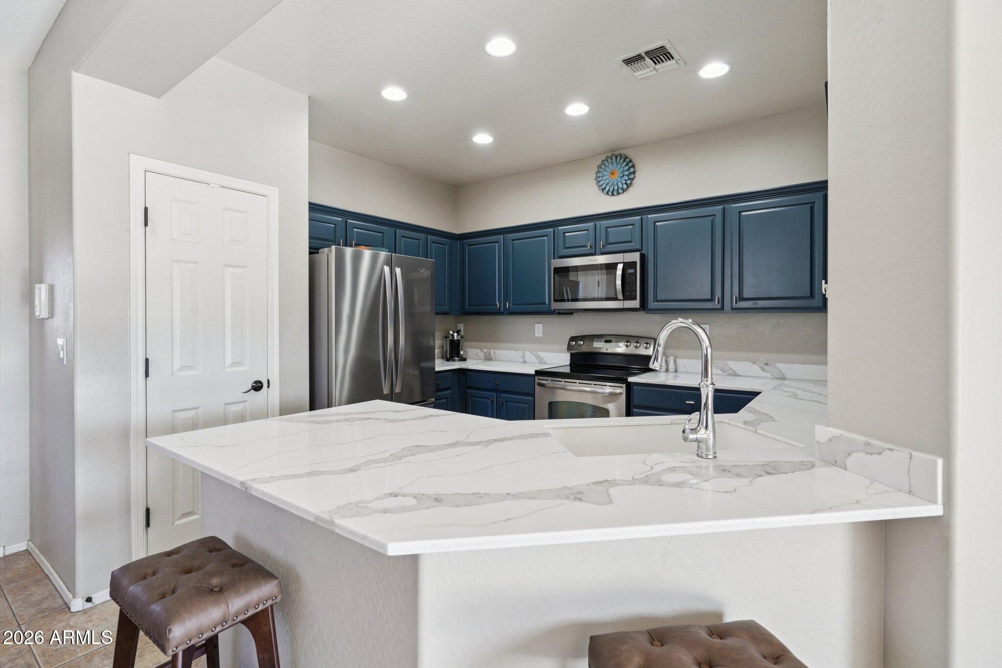 39516 North Noble Hawk Court Phoenix, AZ 85086 - Photo 10 of 62 Remodeled Kitchen