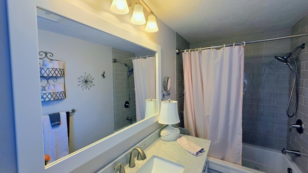 533 Prospect Street West Boylston, MA 01583 - Photo 17 of 40 a bathroom with a sink and a shower