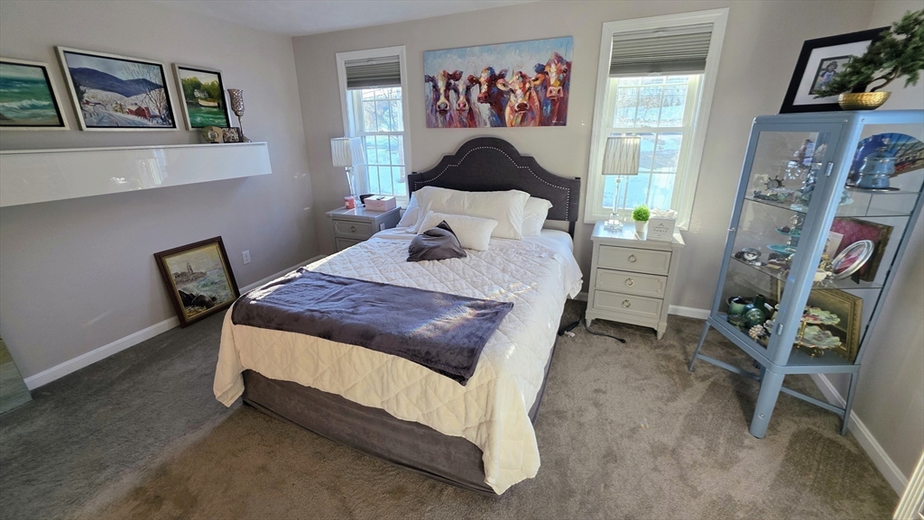 533 Prospect Street West Boylston, MA 01583 - Photo 29 of 40 a bed room with a bed and a chair