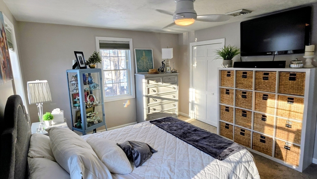 533 Prospect Street West Boylston, MA 01583 - Photo 31 of 40 a bedroom with furniture and a flat screen tv