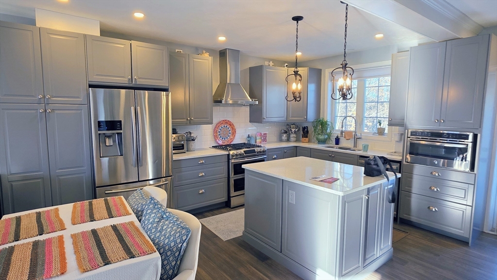 533 Prospect Street West Boylston, MA 01583 - Photo 8 of 40 a kitchen that has a lot of cabinets and refrigerator