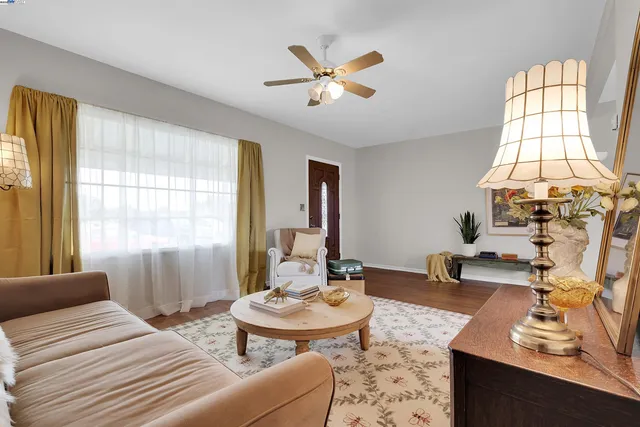 a living room with furniture and window