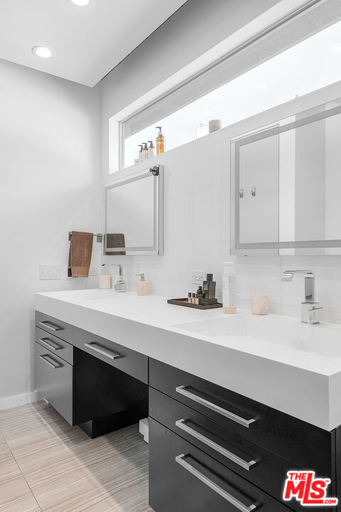 31201 Bailard Road Malibu, CA 90265 - Photo 34 of 56 a room with a sink and a mirror