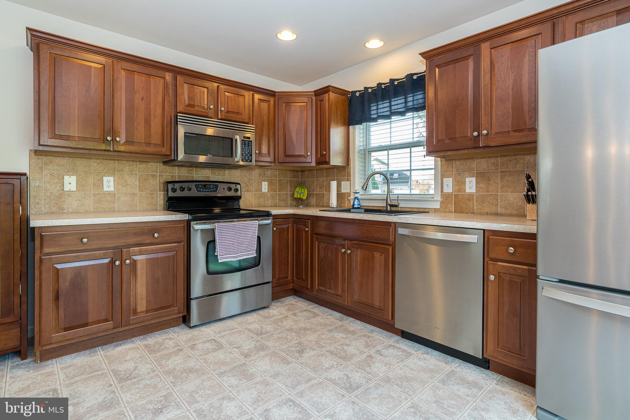 15 Hurst Boulevard Lititz, PA 17543 - Photo 12 of 32 Spacious and efficient kitchen w/ tile backsplash
