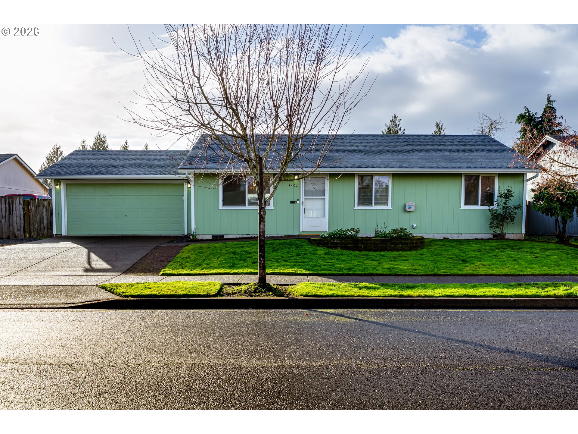 3497 Douglas Drive Springfield, OR 97478 - Photo 1 of 38 a view of a house with a big yard and potted plants
