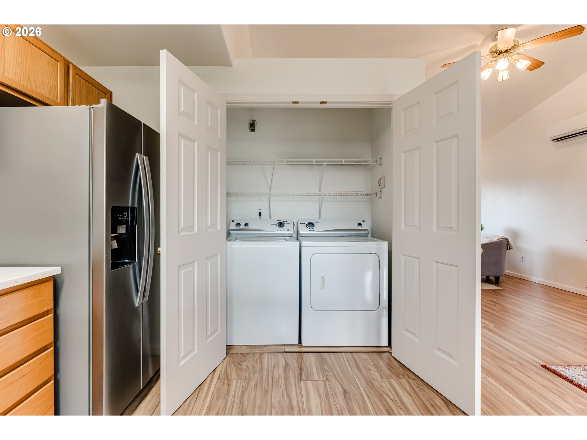 3497 Douglas Drive Springfield, OR 97478 - Photo 16 of 38 a open kitchen with white cabinets and stainless steel appliances