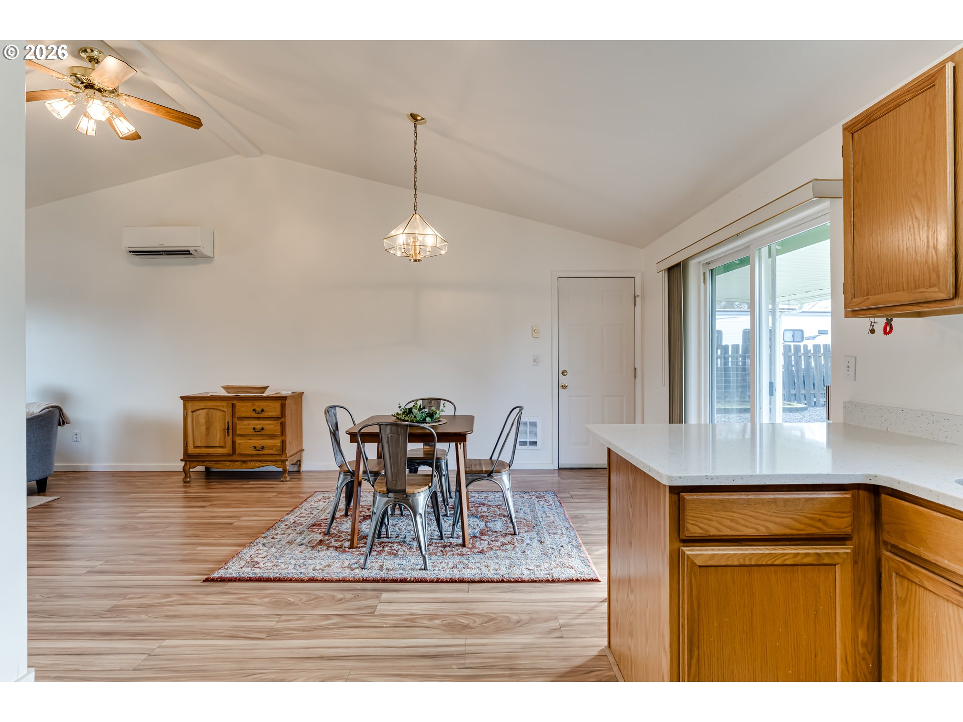 3497 Douglas Drive Springfield, OR 97478 - Photo 17 of 38 a dining room with furniture and a chandelier