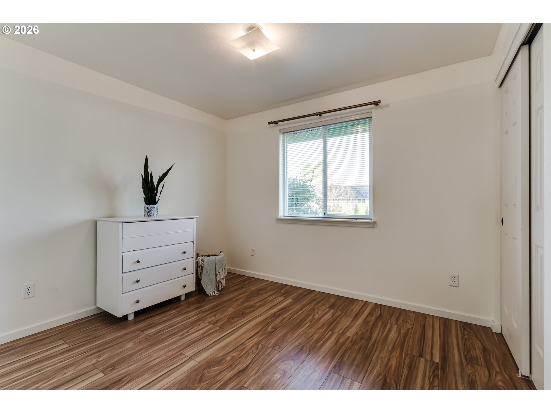 3497 Douglas Drive Springfield, OR 97478 - Photo 26 of 38 a view of an empty room with a window and wooden floor