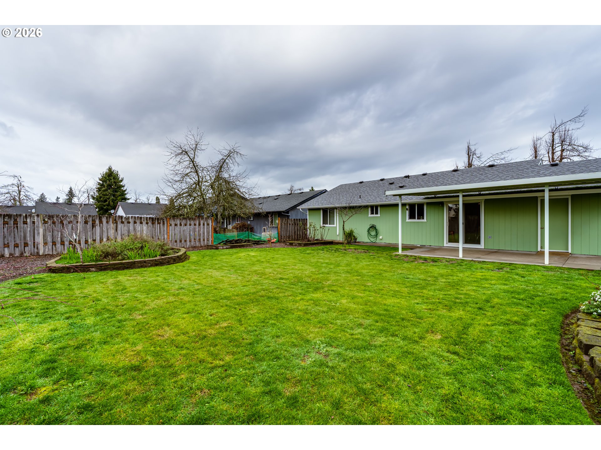 3497 Douglas Drive Springfield, OR 97478 - Photo 34 of 38 a view of an house with backyard space and balcony