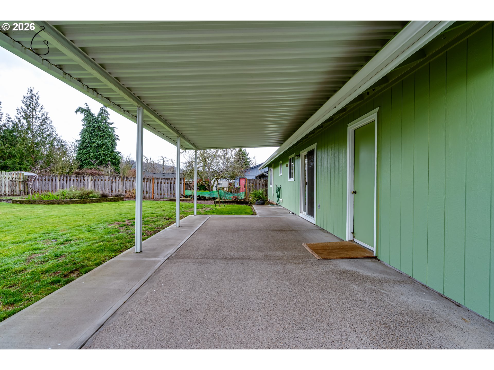 3497 Douglas Drive Springfield, OR 97478 - Photo 38 of 38 a view of a backyard with wooden fence and plants