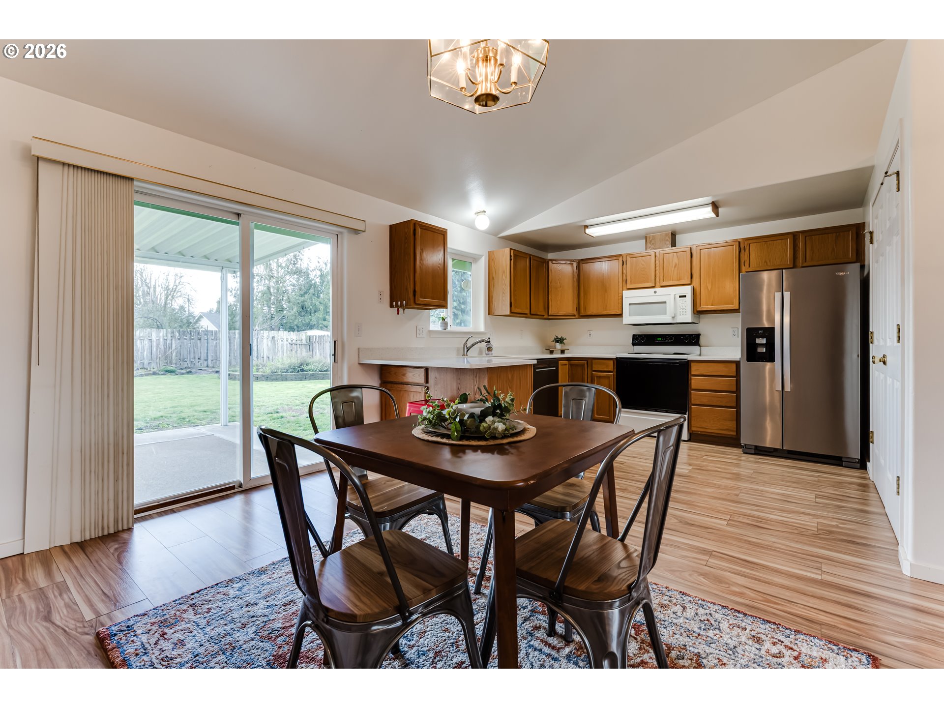 3497 Douglas Drive Springfield, OR 97478 - Photo 8 of 38 a dining room with furniture and wooden floor