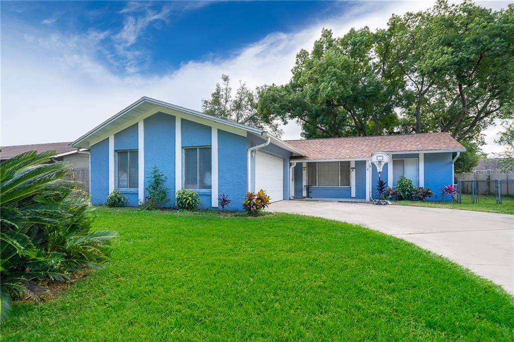 408 Shady Banks Road Altamonte Springs, FL 32714 - Photo 1 of 1 a front view of a house with a garden
