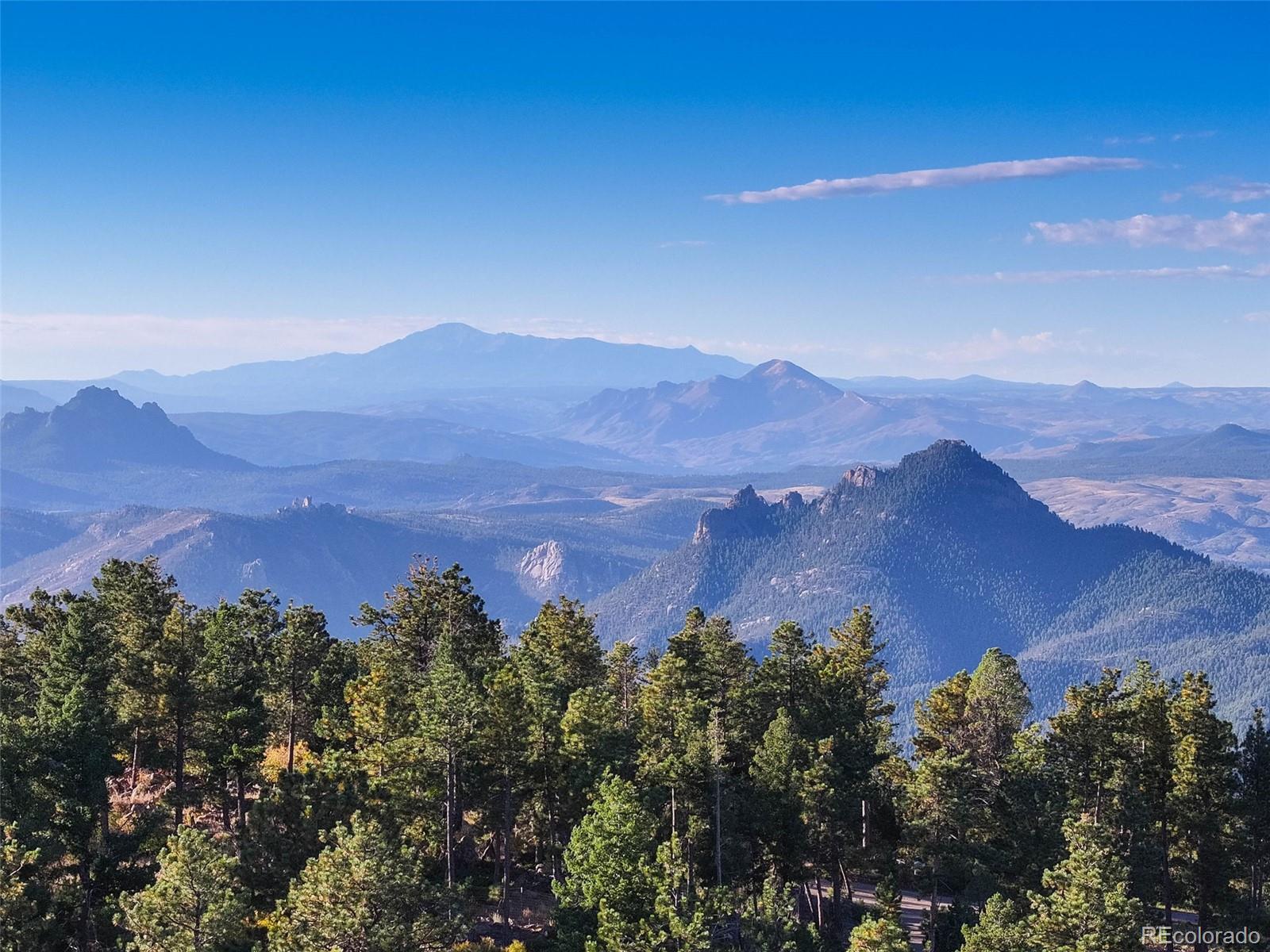 23047 Big Game Trail Conifer, CO 80433 - Photo 29 of 41 an aerial view of mountain with residential house