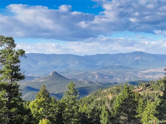 a view of a lake with mountains in the background