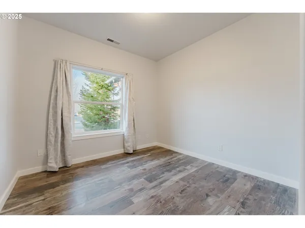 a view of a patio with a yard