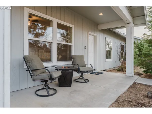 a view of a livingroom with furniture and windows